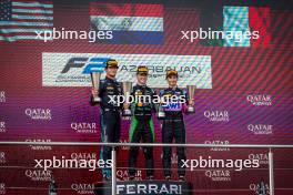 The podium (L to R): Jak Crawford (USA) Dams, second; Joshua Durksen (PAR) AIX Racing, race winner; Gabriele Mini (ITA) Prema Racing, third. 14.09.2024. FIA Formula 2 Championship, Rd 12, Sprint Race, Baku, Azerbaijan, Saturday.