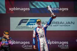 Race winner Richard Verschoor (NED) Trident celebrates on the podium. 15.09.2024. FIA Formula 2 Championship, Rd 12, Feature Race, Baku, Azerbaijan, Sunday.