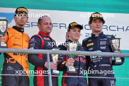 The podium (L to R): Gabriel Bortoleto (BRA) Invicta Racing, second; Isack Hadjar (FRA) Campos Racing, race winner; Jak Crawford (USA) Dams, third. 28.07.2024. Formula 2 Championship, Rd 10, Feature Race, Spa-Francorchamps, Belgium, Sunday.