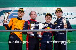 The podium (L to R): Gabriel Bortoleto (BRA) Invicta Racing, second; Isack Hadjar (FRA) Campos Racing, race winner; Jak Crawford (USA) Dams, third. 28.07.2024. Formula 2 Championship, Rd 10, Feature Race, Spa-Francorchamps, Belgium, Sunday.