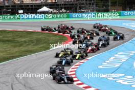 Victor Martins (FRA) ART Grand Prix leads at the start of the race. 22.06.2024. FIA Formula 2 Championship, Rd 6, Sprint Race, Barcelona, Spain, Saturday.