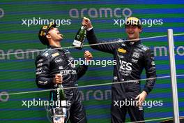 (L to R): Third placed Juan Manuel Correa (USA) Dams celebrates on the podium with race winner and team mate Jak Crawford (USA) Dams. 23.06.2024. FIA Formula 2 Championship, Rd 6, Feature Race, Barcelona, Spain, Sunday.