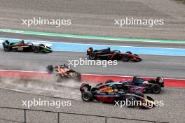 Victor Martins (FRA) ART Grand Prix crashes at the start of the race with Josep Maria Marti (ESP) Campos Racing and Dennis Hauger (DEN) MP Motorsport. 23.06.2024. FIA Formula 2 Championship, Rd 6, Feature Race, Barcelona, Spain, Sunday.
