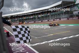 Race winner Isack Hadjar (FRA) Campos Racing takes the chequered flag at the end of the race. 07.07.2024. FIA Formula 2 Championship, Rd 8, Feature Race, Silverstone, England, Sunday.