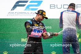 Kush Maini (IND) Invicta Racing celebrates his second position on the podium. 20.07.2024. FIA Formula 2 Championship, Rd 9, Budapest, Hungary, Sprint Race, Saturday.