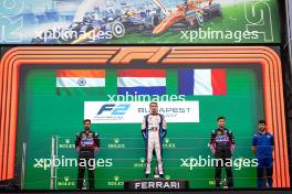 The podium (L to R): Kush Maini (IND) Invicta Racing, second; Richard Verschoor (NED) Trident, race winner; Victor Martins (FRA) ART Grand Prix, third. 20.07.2024. FIA Formula 2 Championship, Rd 9, Budapest, Hungary, Sprint Race, Saturday.
