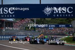 (L to R): Paul Aron (EST) Hitech Pule-Eight and Amaury Cordeel (BEL) Hitech Pule-Eight lead at the start of the race. 18.05.2024. FIA Formula 2 Championship, Rd 4, Sprint Race, Imola, Italy, Saturday.