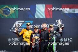The podium (L to R): Gabriel Bortoleto (BRA) Invicta Racing, second; Isack Hadjar (FRA) Campos Racing, race winner; Joshua Durksen (PAR) AIX Racing, third. 19.05.2024. FIA Formula 2 Championship, Rd 4, Feature Race, Imola, Italy, Sunday.