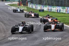 Ritomo Miyata (JPN) Rodin Motorsport and Rafael Villagomez (MEX) Van Amersfoort Racing battle for position. 31.08.2024. Formula 2 Championship, Rd 11, Sprint Race, Monza, Italy, Saturday.