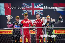 The podium (L to R): Victor Martins (FRA) ART Grand Prix, second; Oliver Bearman (GBR) Prema Racing, race winner; Joshua Durksen (PAR) AIX Racing, third. 31.08.2024. Formula 2 Championship, Rd 11, Sprint Race, Monza, Italy, Saturday.