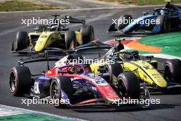 Richard Verschoor (NED) Trident is passed by Gabriel Bortoleto (BRA) Invicta Racing. 01.09.2024. Formula 2 Championship, Rd 11, Feature Race, Monza, Italy, Sunday.