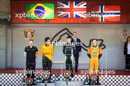 The podium (L to R): Gabriel Bortoleto (BRA) Invicta Racing, second; Taylor Barnard (GBR) AIX Racing, race winner; Dennis Hauger (DEN) MP Motorsport, third. 25.05.2024. FIA Formula 2 Championship, Rd 5, Monte Carlo, Monaco, Sprint Race, Saturday.
