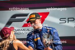 Race winner Luke Browning (GBR) Hitech Pulse-Eight celebrates on the podium. 30.06.2024. FIA Formula 3 Championship, Rd 6, Feature Race, Spielberg, Austria, Sunday.