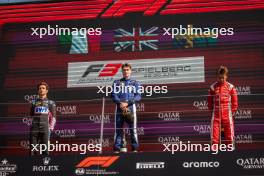 The podium (L to R): Gabriele Mini (ITA) Prema Racing, second; Luke Browning (GBR) Hitech Pulse-Eight, race winner; Dino Beganovic (SWE) Prema Racing, third. 30.06.2024. FIA Formula 3 Championship, Rd 6, Feature Race, Spielberg, Austria, Sunday.