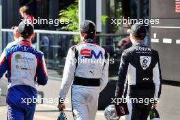 (L to R): Leonardo Fornaroli (ITA) Trident, third; Sebastian Montoya (COL) Campos Racing, second; Callum Voisin (GBR) Rodin Motorsport, race winner - walk through the F1 Paddock. 28.07.2024. Formula 3 Championship, Rd 9, Feature Race, Spa-Francorchamps, Belgium, Sunday.