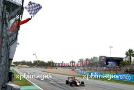 Race winner Arvid Lindblad (GBR) Prema Racing takes the chequered flag at the end of the race. 23.06.2024. FIA Formula 3 Championship, Rd 5, Feature Race, Barcelona, Spain, Sunday.