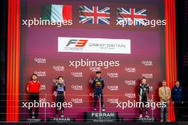 The podium (L to R): Gabriele Mini (ITA) Prema Racing, second; Arvid Lindblad (GBR) Prema Racing, race winner; Callum Voisin (GBR) Rodin Motorsport, third. 07.07.2024. FIA Formula 3 Championship, Rd 7, Feature Race, Silverstone, England, Sunday.