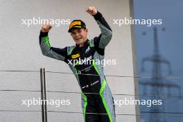 Race winner Nikita Bedrin (ITA) AIX Racing celebrates on the podium. 20.07.2024. FIA Formula 3 Championship, Rd 8, Sprint Race, Budapest, Hungary, Saturday.