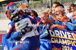 Leonardo Fornaroli (ITA) Trident celebrates third position and becoming F3 Champion in parc ferme with race winner and team mate Sami Meguetounif (FRA) Trident. 01.09.2024. Formula 3 Championship, Rd 10, Feature Race, Monza, Italy, Sunday.