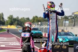 (L to R): Second placed Gabriele Mini (ITA) Prema Racing with third placed F3 champion Leonardo Fornaroli (ITA) Trident in parc ferme. 01.09.2024. Formula 3 Championship, Rd 10, Feature Race, Monza, Italy, Sunday.