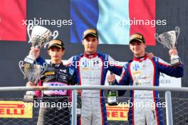 The podium (L to R): Gabriele Mini (ITA) Prema Racing, second; Sami Meguetounif (FRA) Trident, race winner; Leonardo Fornaroli (ITA) Trident, third and F3 Champion. 01.09.2024. Formula 3 Championship, Rd 10, Feature Race, Monza, Italy, Sunday.