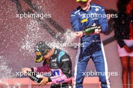 Race winner Gabriele Mini (ITA) Prema Racing celebrates on the podium with third placed Luke Browning (GBR) Hitech Pulse-Eight. 26.05.2024. FIA Formula 3 Championship, Rd 4, Feature Race, Monte Carlo, Monaco, Sunday.