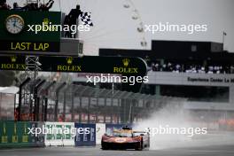 Race winners Antonio Fuoco (ITA) / Miguel Molina (ESP) / Nicklas Nielsen (DEN) #50 Ferrari AF Corse, Ferrari 499P take the chequered flag at the end of the race. 16.06.2024. FIA World Endurance Championship, Round 4, Le Mans 24 Hours, Race, Le Mans, France, Sunday.