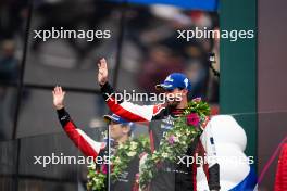 Jose Maria Lopez (ARG) / Kamui Kobayashi (JPN) / Nyck de Vries (NLD) #07 Toyota Gazoo Racing, celebrate second position on the podium. 16.06.2024. FIA World Endurance Championship, Round 4, Le Mans 24 Hours, Race, Le Mans, France, Sunday.