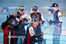 Race winners Sebastien Buemi (SUI), Brendon Hartley, and Ryo Hirakawa (JPN) #08 Toyota Gazoo Racing, celebrate on the podium. 14.07.2024. FIA World Endurance Championship, Round 5, Six Hours of Sao Paulo, Sao Paulo, Brazil.
