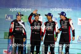 Race winners Sebastien Buemi (SUI), Brendon Hartley, and Ryo Hirakawa (JPN) #08 Toyota Gazoo Racing, celebrate on the podium. 14.07.2024. FIA World Endurance Championship, Round 5, Six Hours of Sao Paulo, Sao Paulo, Brazil.