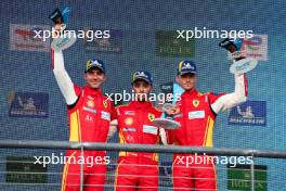 Miguel Molina (ESP), Antonio Fuoco (ITA), and Nicklas Nielsen (DEN) #50 Ferrari AF Corse, celebrate third position on the podium. 01.09.2024. FIA World Endurance Championship, Rd 6, Lone Star COTA, Circuit of the Americas, Austin, Texas, USA.