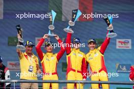 Race winners Yifei Ye (CHN), Robert Shwartzman (ISR), and Robert Kubica (POL) #83 AF Corse Ferrari celebrate on the podium. 01.09.2024. FIA World Endurance Championship, Rd 6, Lone Star COTA, Circuit of the Americas, Austin, Texas, USA.