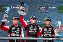 Kamui Kobayashi (JPN), Mike Conway (GBR) and Nyck de Vries (NLD) #07 Toyota Gazoo Racing, celebrate second position on the podium. 01.09.2024. FIA World Endurance Championship, Rd 6, Lone Star COTA, Circuit of the Americas, Austin, Texas, USA.