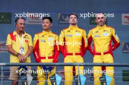 Race winners Yifei Ye (CHN), Robert Shwartzman (ISR), and Robert Kubica (POL) #83 AF Corse Ferrari celebrate on the podium. 01.09.2024. FIA World Endurance Championship, Rd 6, Lone Star COTA, Circuit of the Americas, Austin, Texas, USA.