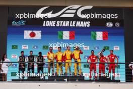 The podium (L to R): Kamui Kobayashi (JPN), Mike Conway (GBR) and Nyck de Vries (NLD) #07 Toyota Gazoo Racing, second; Yifei Ye (CHN), Robert Shwartzman (ISR), and Robert Kubica (POL) #83 AF Corse Ferrari, race winners; Miguel Molina (ESP), Antonio Fuoco (ITA), and Nicklas Nielsen (DEN) #50 Ferrari AF Corse, third. 01.09.2024. FIA World Endurance Championship, Rd 6, Lone Star COTA, Circuit of the Americas, Austin, Texas, USA.