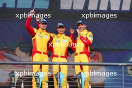 Race winners Robert Shwartzman (ISR), Yifei Ye (CHN), and Robert Kubica (POL) #83 AF Corse Ferrari celebrate on the podium. 01.09.2024. FIA World Endurance Championship, Rd 6, Lone Star COTA, Circuit of the Americas, Austin, Texas, USA.