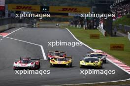 (L to R): Kevin Estre (FRA) / Andre Lotterer (GER) / Laurens Vanthoor (BEL) #06 Porsche Penske Motorsport, Porsche 963; Robert Kubica (POL) / Robert Shwartzman (ISR) / Yifei Ye (CHN) #83 AF Corse Ferrari 499P; and Claudio Schiavoni (ITA) / Matteo Cressoni (ITA) / Franck Perera (FRA) #60 Iron Lynx Lamborghini Huracan LMGT3 Evo2. 15.09.2024. FIA World Endurance Championship, Round 7, Six Hours of Fuji, Fuji, Japan, Sunday.