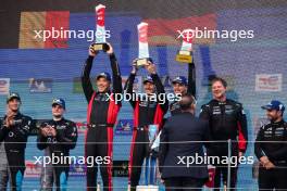 Race winners Kevin Estre (FRA) / Andre Lotterer (GER) / Laurens Vanthoor (BEL) #06 Porsche Penske Motorsport, celebrate on the podium. 15.09.2024. FIA World Endurance Championship, Round 7, Six Hours of Fuji, Fuji, Japan, Sunday.