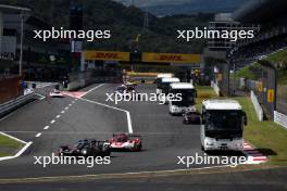 Mike Conway (GBR) / Kamui Kobayashi (JPN) / Nyck de Vries (NLD) #07 Toyota Gazoo Racing, Toyota GR010 Hybrid as coaches run on the circuit for 'Circuit Safari'.  14.09.2024. FIA World Endurance Championship, Round 7, Six Hours of Fuji, Fuji, Japan, Saturday.