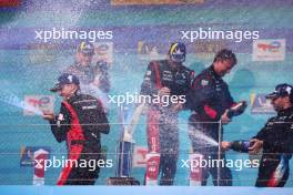 Race winners Kevin Estre (FRA) / Andre Lotterer (GER) / Laurens Vanthoor (BEL) #06 Porsche Penske Motorsport, celebrate on the podium. 15.09.2024. FIA World Endurance Championship, Round 7, Six Hours of Fuji, Fuji, Japan, Sunday.