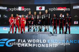 The podium (L to R): James Calado (GBR) / Alessandro Pier Guidi (ITA) / Antonio Giovinazzi (ITA) #51 AF Corse Ferrari, second; Sebastien Buemi (SUI) / Brendon Hartley (NZL) / Ryo Hirakawa (JPN) #08 Toyota Gazoo Racing, Toyota GR010, Hybrid, race winners; Matt Campbell (AUS) / Michael Christensen (DEN) / Frederic Makowiecki (FRA) #05 Porsche Penske Motorsport, third. 02.11.2024. FIA World Endurance Championship, Round 8, Eight Hours of Bahrain, Sakhir, Bahrain, Saturday.