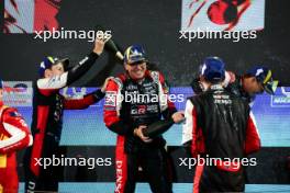 Race winners Sebastien Buemi (SUI) / Brendon Hartley (NZL) / Ryo Hirakawa (JPN) #08 Toyota Gazoo Racing, celebrate on the podium. 02.11.2024. FIA World Endurance Championship, Round 8, Eight Hours of Bahrain, Sakhir, Bahrain, Saturday.