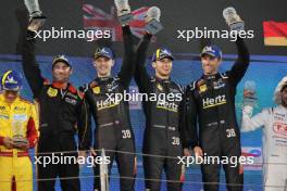 Jenson Button (GBR) / Philip Hanson (GBR) / Oliver Rasmussen (DEN) #38 Hertz Team Jota Porsche celebrate first position on the Privateer podium. 02.11.2024. FIA World Endurance Championship, Round 8, Eight Hours of Bahrain, Sakhir, Bahrain, Saturday.