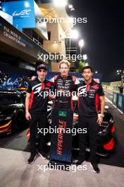 (L to R): Sebastien Buemi (SUI) / Brendon Hartley (NZL) / Ryo Hirakawa (JPN) #08 Toyota Gazoo Racing, Toyota GR010, Hybrid, celebrate pole position in parc ferme. 01.11.2024. FIA World Endurance Championship, Round 8, Eight Hours of Bahrain, Sakhir, Bahrain, Friday.