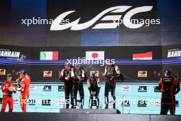 Race winners Sebastien Buemi (SUI) / Brendon Hartley (NZL) / Ryo Hirakawa (JPN) #08 Toyota Gazoo Racing, celebrate on the podium. 02.11.2024. FIA World Endurance Championship, Round 8, Eight Hours of Bahrain, Sakhir, Bahrain, Saturday.