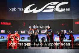 The podium (L to R): James Calado (GBR) / Alessandro Pier Guidi (ITA) / Antonio Giovinazzi (ITA) #51 AF Corse Ferrari, second; Sebastien Buemi (SUI) / Brendon Hartley (NZL) / Ryo Hirakawa (JPN) #08 Toyota Gazoo Racing, Toyota GR010, Hybrid, race winners; Matt Campbell (AUS) / Michael Christensen (DEN) / Frederic Makowiecki (FRA) #05 Porsche Penske Motorsport, third. 02.11.2024. FIA World Endurance Championship, Round 8, Eight Hours of Bahrain, Sakhir, Bahrain, Saturday.