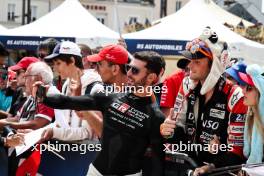 Jose Maria Lopez (ARG) Toyota Gazoo Racing with fans at the town parade. 07-09.06.2024. FIA World Endurance Championship, Le Mans Scrutineering and Test, Le Mans, France.