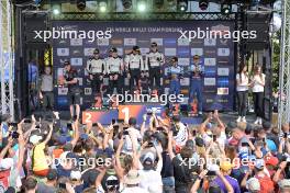 The podium (L to R): Elfyn Evans (GBR) / Scott Martin (GBR) Toyota Gazoo Racing WRT, Toyota Yaris Rally1 Hybrid, second; Kalle Rovanpera (FIN) / Jonne Halttunen (FIN) Toyota Gazoo Racing WRT, Toyota GR Yaris Rally1 Hybrid, winners; Adrien Fourmaux (FRA) / Alexandre Coria (FRA) M-Sport Ford World Rally Team Ford Puma Rally1 Hybrid, third. 27-30.06.2024. World Rally Championship, Rd 7, 80th Rally Poland, Mikolajki, Poland. www.xpbimages.com, EMail: requests@xpbimages.com © Copyright: XPB Images